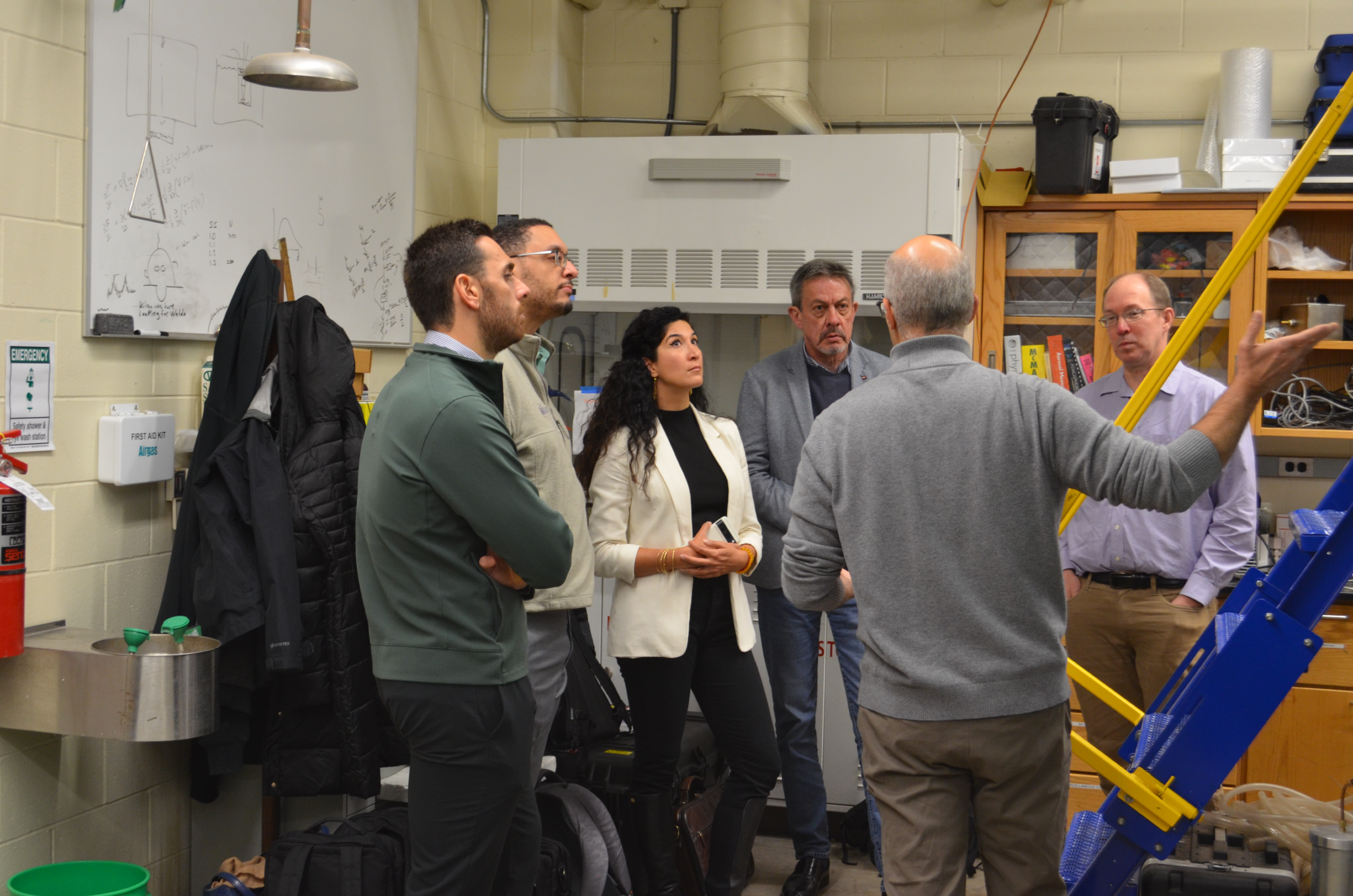 UAE REP review team in the chamber lab with Will Cantrell and Raymond Shaw.