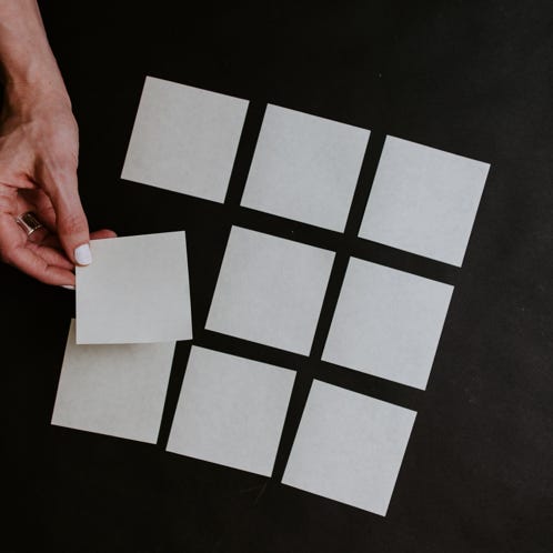 Cars on Road Near High Rise Buildings