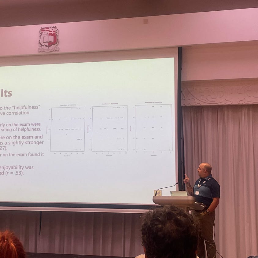 Man Beside Flat Screen Television With Photos Background